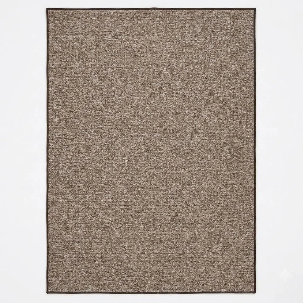 Alfombra Azor Estilo Moderno, Textura Lisa cálida y Acabado Decorativo para ambientes acogedores – 40x60 cm – Marrón