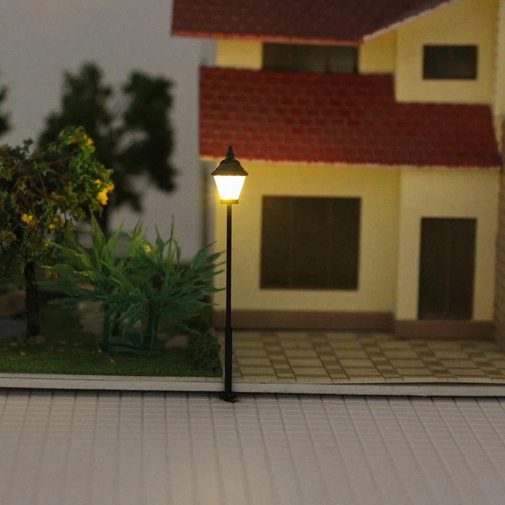 Evemodel 10 Piezas modelismo ferroviario Escala HO Farolas de Luces de Calle de Cabeza única Leds Nuevos Miniatura Blanco cálido