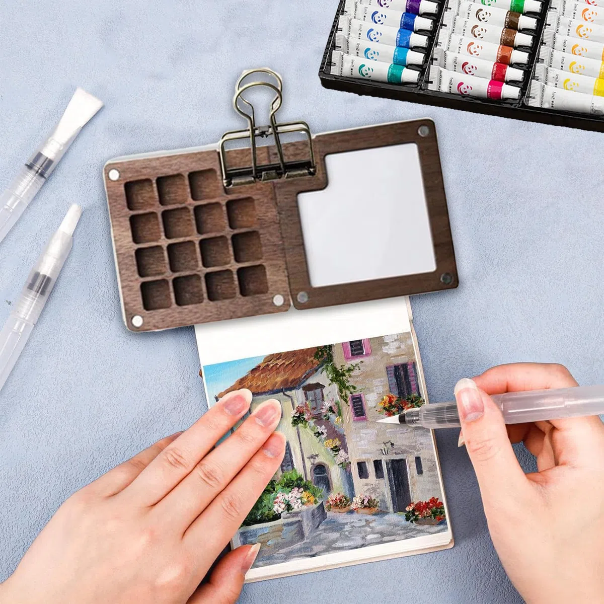 Set de Mini Acuarelas Portátil con 24 Colores Intensos 15 Rejillas Mini Almohadilla de Pintura para Viajes con Clip Metálico para Artistas Estudiantes Viajes