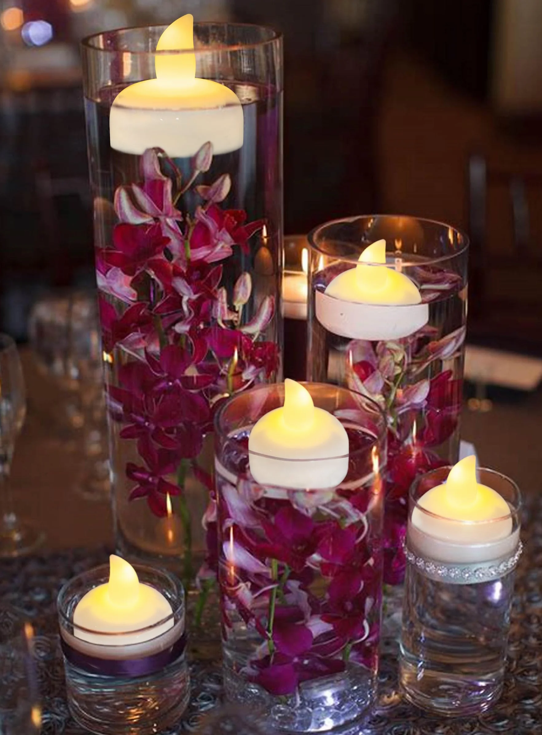 Paquete de 24 velas flotantes sin llama, impermeables, de color blanco cálido, pilas incluidas, luces LED parpadeantes para exteriores, jarrón de centro de mesa